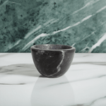 black marble shaving bowl on counter